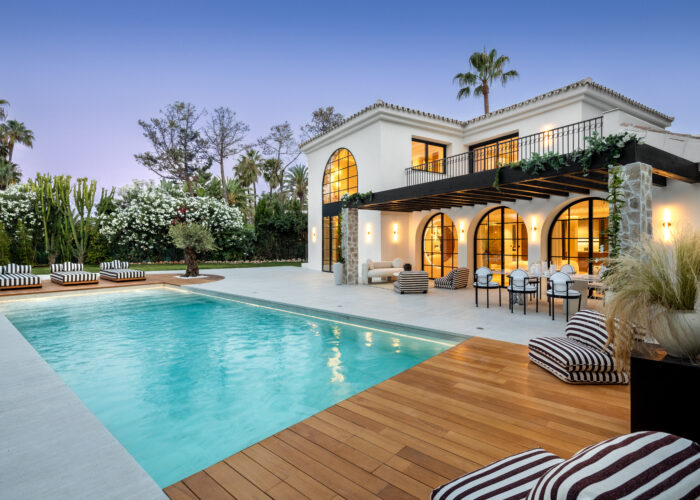 Luxury Marbella rental renovation outdoor terrace with pool and lounge